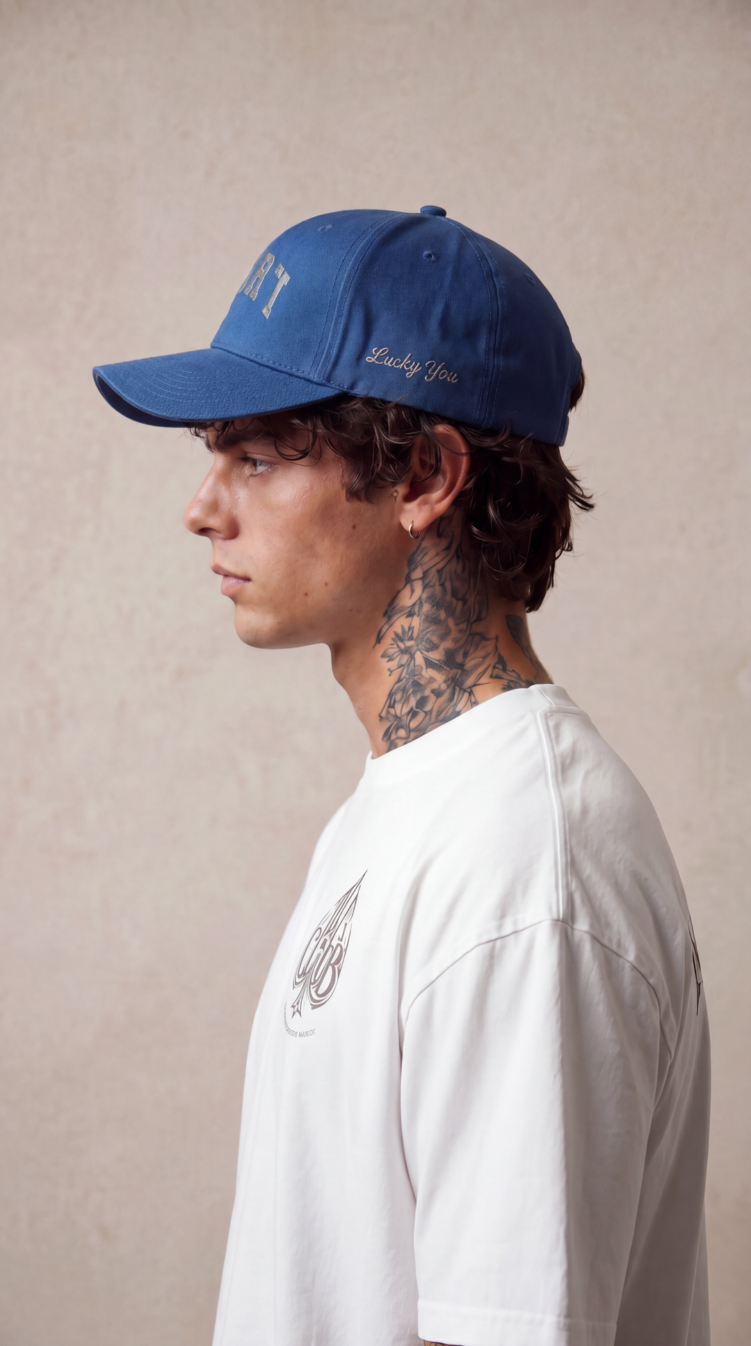 Lucky Spade cap in rich blue with medium grey embroidery, Tilted Spades