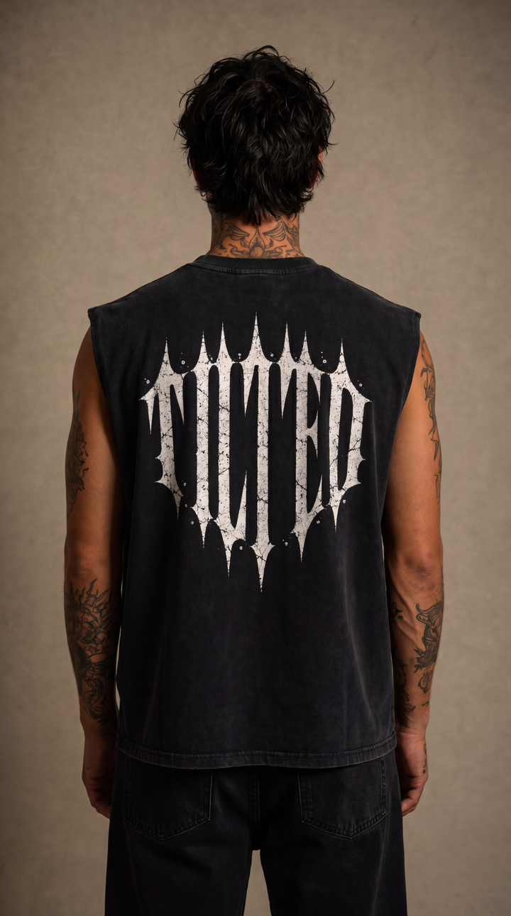 Back view of the black sleeveless Tilted tank top, beige studio, Tilted Spades
