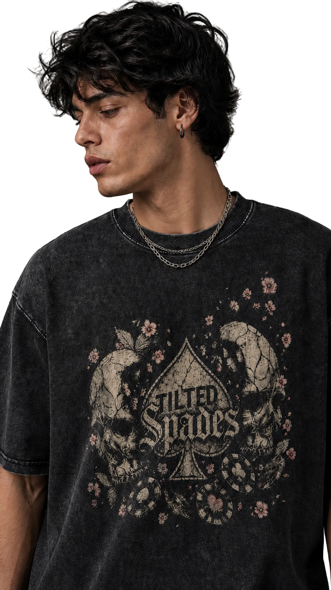 Close-up crop of the No Saints tee showing the skull graphic and layered necklaces, Tilted Spades