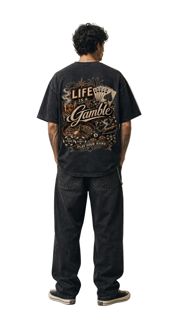 Rear view of the Life is a Gamble vintage washed oversized tee showing the casino back graphic, Tilted Spades