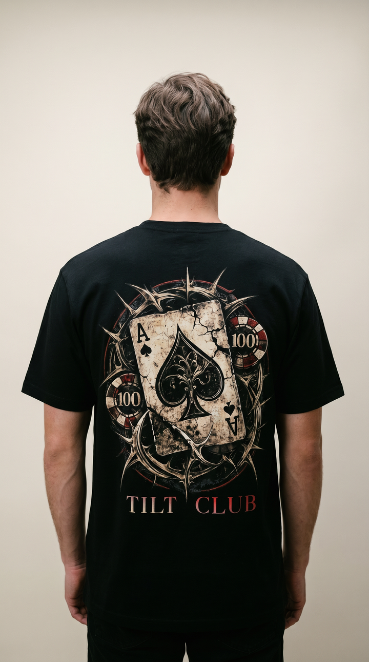 Model wearing the back design of the Crown of Risk spade graphic shirt, Tilted Spades