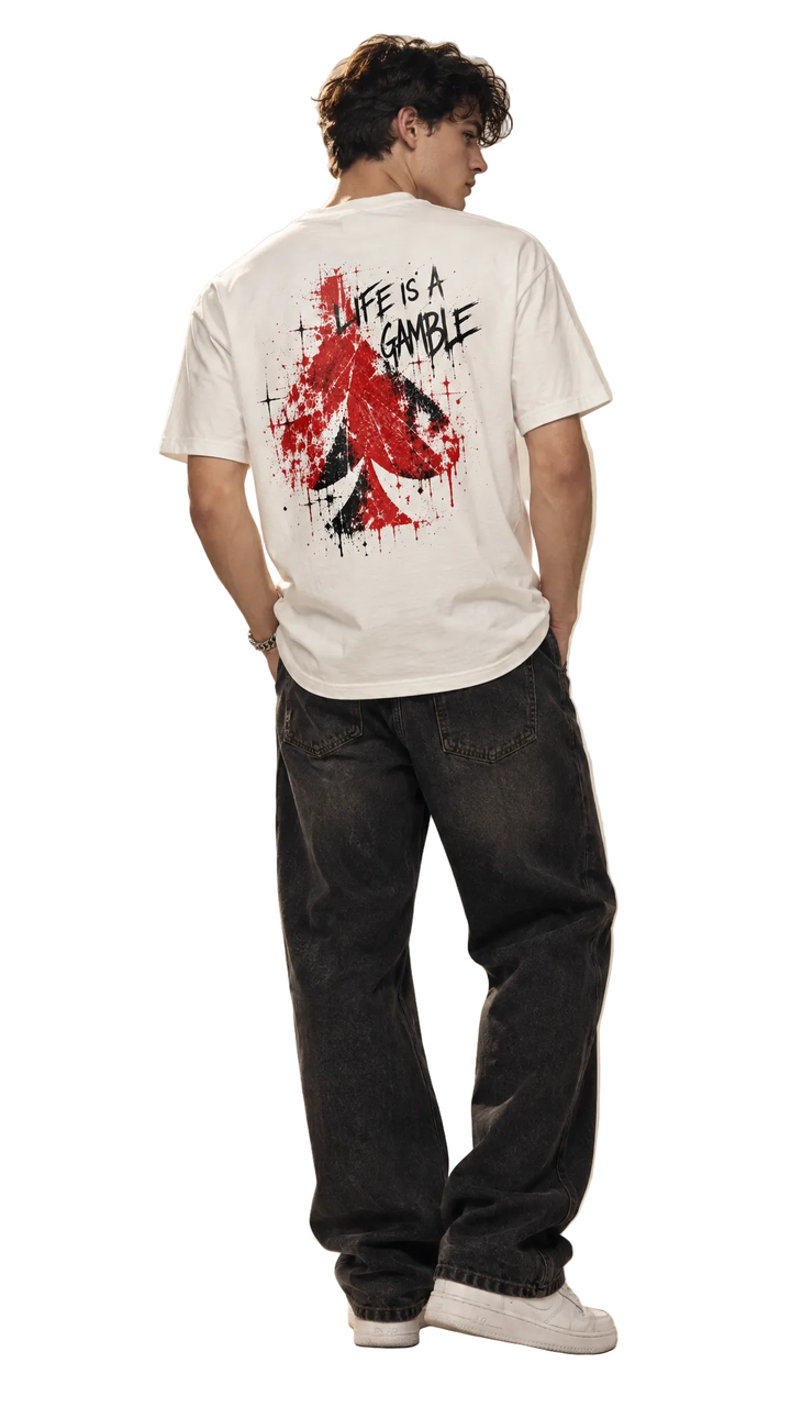 Male model wearing the back design of the Fortuna tee, white studio, Tilted Spades
