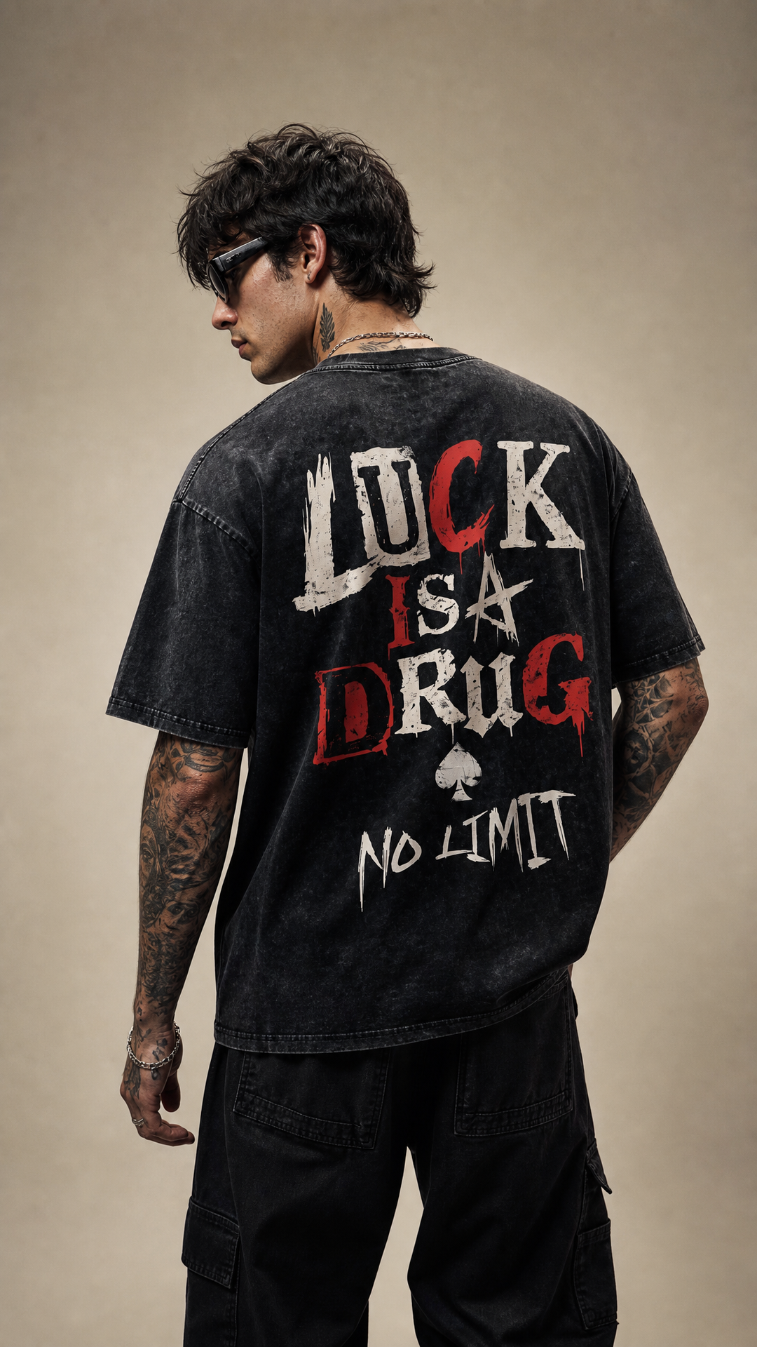 Model wearing the back design of The Addiction washed tee, Tilted Spades