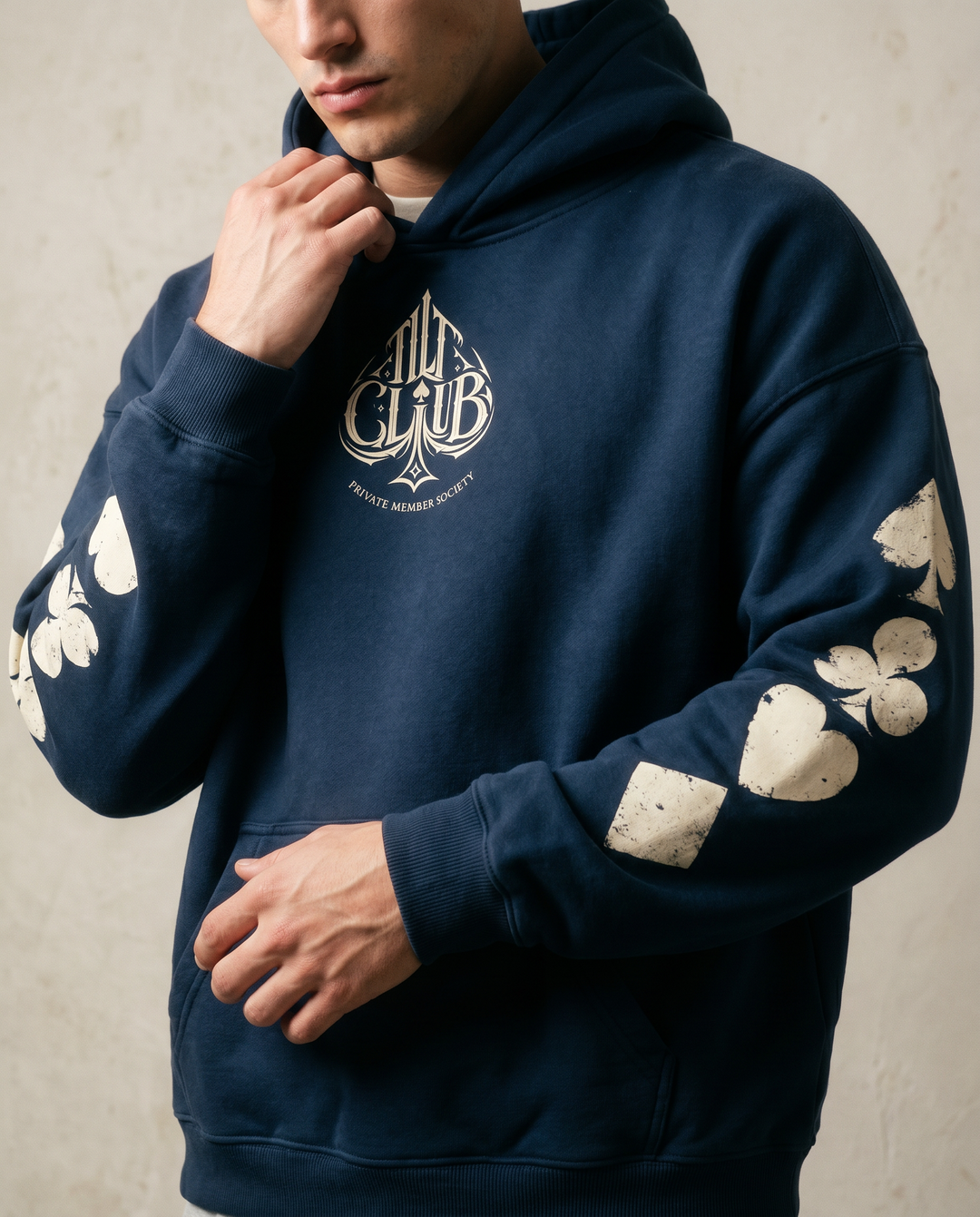 Close-up of the front of the Spyre Hoodie, white studio, Tilted Spades