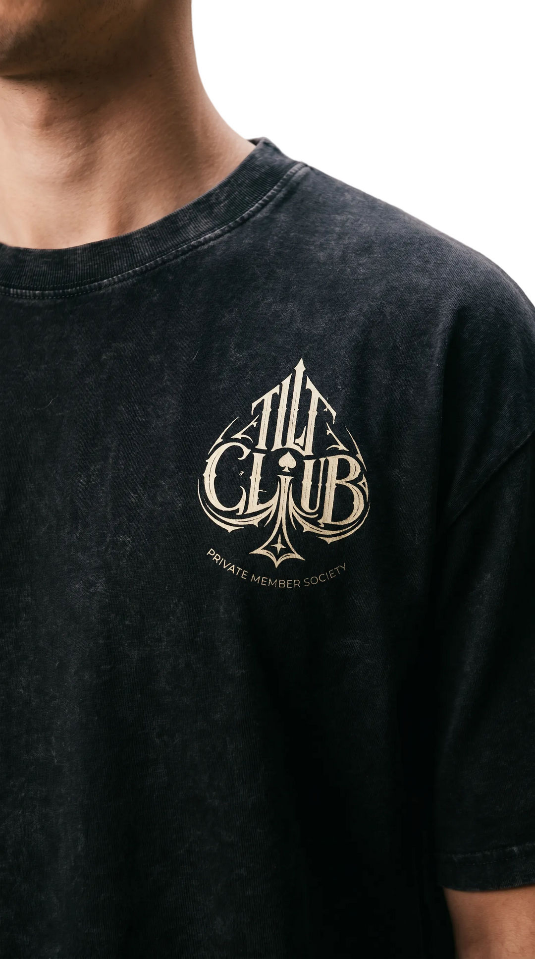Close-up of a left chest graphic print worn by a model, Tilted Spades