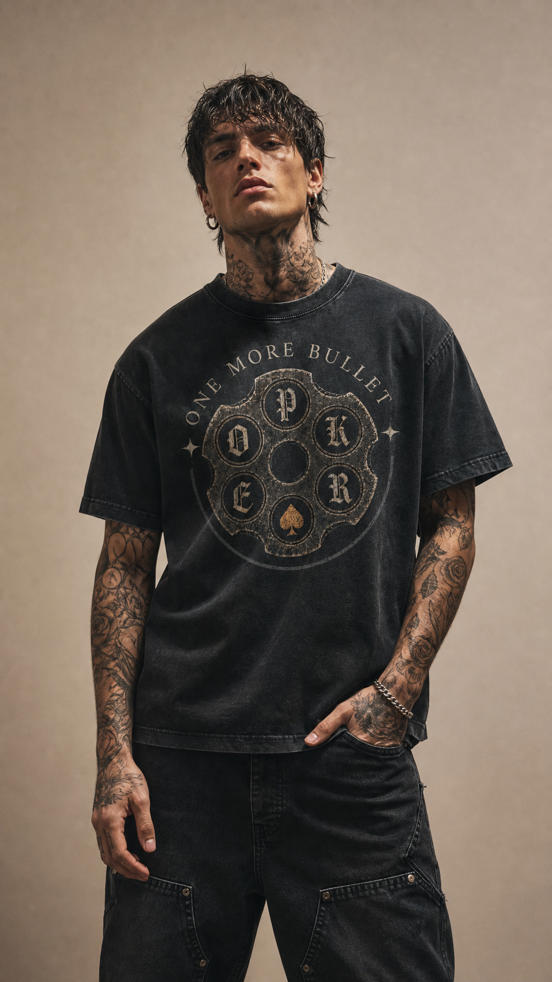 Male model with tattoos wearing The Chamber snow washed tee, white studio, Tilted Spades