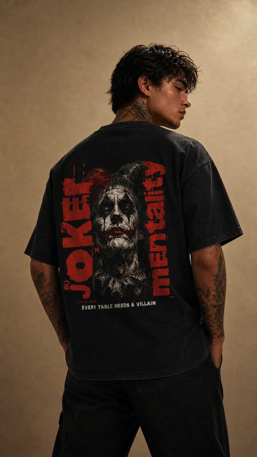 Model wearing the back design of the Joker Mentality tee, white studio, Tilted Spades