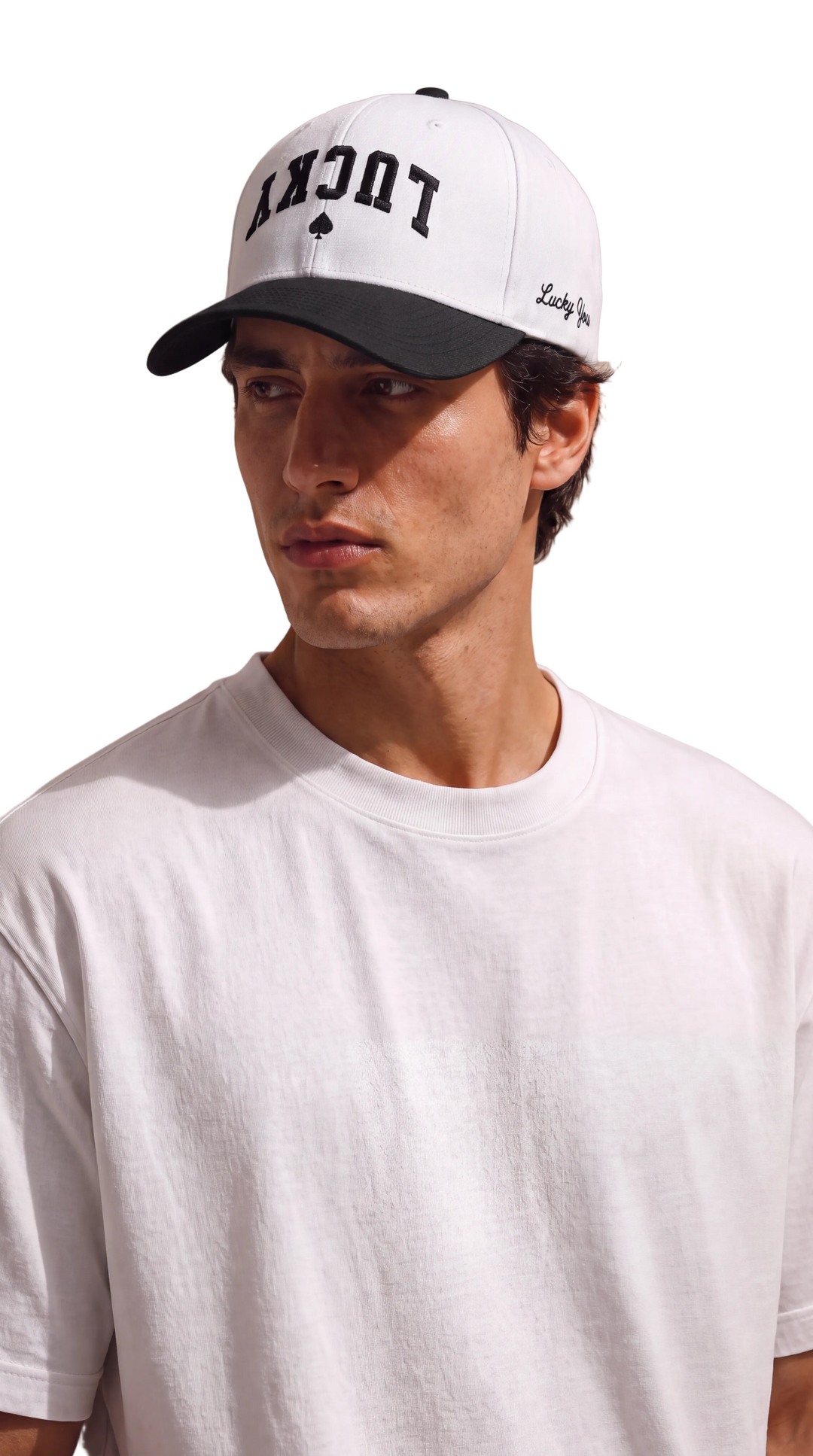 White Lucky Spade snapback with black curved brim and spade embroidery, Tilted Spades