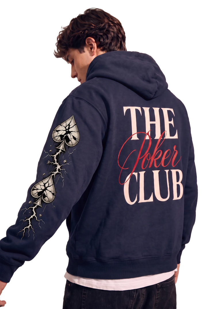 Close-up of cracked spade sleeve artwork on The Club Hoodie, Tilted Spades