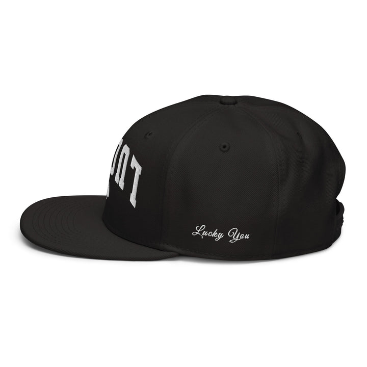 Black snapback cap mockup, left side view, Tilted Spades