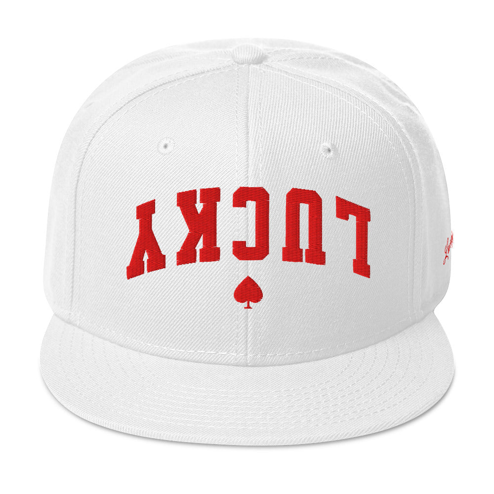 White snapback cap mockup, front view, Tilted Spades